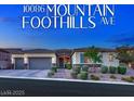 Charming single-story home with a three-car garage, well-maintained landscaping, and inviting curb appeal at 10086 Mountain Foothills Ave, Las Vegas, NV 89149