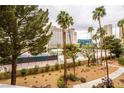 Relax on your private balcony enjoying the beautiful community views, tennis courts, and professional landscaping at 205 E Harmon Ave # 409, Las Vegas, NV 89169