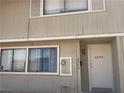 View of a two-story building with a simple exterior and functional design at 2574 Paradise Village Way, Las Vegas, NV 89120