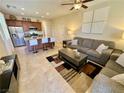 View of a spacious living room adjacent to the open kitchen layout at 2707 Chinaberry Hill St, Laughlin, NV 89029