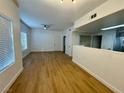 Inviting living room with wood-look floors, neutral paint, and great natural light at 3400 Cabana Dr # 1033, Las Vegas, NV 89122