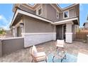 Cozy front patio with comfortable seating and a 'Welcome' sign, perfect for relaxing outdoors at 356 Silva Pl, Henderson, NV 89011
