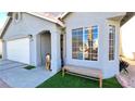 Charming single-story home featuring a stucco exterior, arched entryway, and well-manicured landscaping at 5929 Royal Castle Ln, Las Vegas, NV 89130