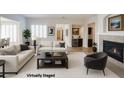 Bright living room featuring neutral tones, fireplace, and large windows at 6134 Burleson Ranch Rd, Las Vegas, NV 89131