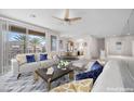 Spacious living room with balcony access and ample natural light perfect for entertaining and relaxation at 805 Dana Hills Ct # 104, Las Vegas, NV 89134
