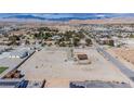 Desert homesite with a small casita, offering expansive views and development potential in a quiet residential area at 8430 Gagnier Blvd, Las Vegas, NV 89113
