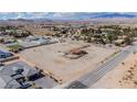 Desert homesite with a small casita, offering expansive views and development potential in a quiet residential area at 8430 Gagnier Blvd, Las Vegas, NV 89113