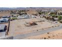 Desert homesite with a small casita, offering expansive views and development potential in a quiet residential area at 8430 Gagnier Blvd, Las Vegas, NV 89113