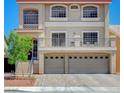Elegant two-story home with a covered balcony and two-car garage offers curb appeal and modern amenities at 9656 Paraiso Springs St, Las Vegas, NV 89139