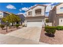 Beautiful two-story home with a two-car garage, xeriscaping, and manicured shrubbery at 9740 Floweret Ave, Las Vegas, NV 89117