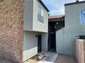Side view of multi-Gathering building with stucco and brick, showcasing the entrance and stairs at , Las Vegas, NV 89119