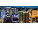 Stunning city view featuring upscale hotels and casinos brightly illuminated at night at 145 E Harmon Ave # 3807, Las Vegas, NV 89109
