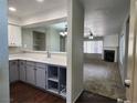 Open kitchen view featuring a breakfast bar overlooking the spacious living room at 2020 Mesquite Ln # 205, Laughlin, NV 89029