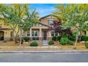 Inviting two-story home with well-manicured landscaping at 3141 Monet Sunrise Ave, Henderson, NV 89044