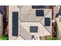 An aerial closeup of the tiled roof featuring installed solar panels at 3367 Popcorn Flower St, Las Vegas, NV 89117