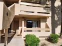 Condo entrance with patio and desert landscaping at 3750 Desert Marina Dr # 37, Laughlin, NV 89029