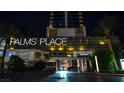 The Palms Place exterior features illuminated signage, modern architecture, and lush landscaping at 4381 W Flamingo Rd # 2302, Las Vegas, NV 89103
