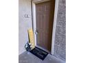 A welcoming entryway features a welcome mat and decorative accents, setting a warm tone at 4965 Indian River Dr # 101, Las Vegas, NV 89103