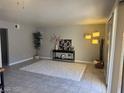Bright living room with modern decor, neutral colors, and lots of natural light at 4965 Indian River Dr # 101, Las Vegas, NV 89103