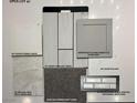 Selection board showcasing modern design elements, including quartz countertops, gray cabinets, and drift wood flooring at 77 Tardando St, Henderson, NV 89015