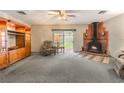 Cozy living room featuring a brick fireplace and comfortable seating arrangement at 1904 Fontenelle St, Las Vegas, NV 89102