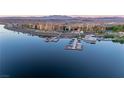 Picturesque aerial view of a waterfront property with a marina, showcasing the serene lake setting at 20 Via Mantova # 306, Henderson, NV 89011