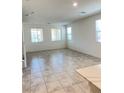 Spacious living room featuring neutral walls and ample sunlight at 2444 Padulle Pl, Henderson, NV 89044