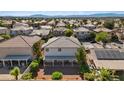 Aerial view of a home featuring a large covered patio in the backyard at 272 Violet Note St, Henderson, NV 89074