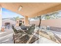 Spacious covered patio with comfortable seating, ideal for outdoor entertaining and relaxation at 5405 Lucky Clover St, Las Vegas, NV 89149