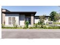 Contemporary home highlighting modern architectural design and natural desert landscaping at 5855 St Ebbes Ct, Las Vegas, NV 89131