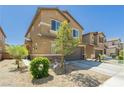 Attractive two-story home with low-maintenance front yard and attached two-car garage in a residential neighborhood at 6409 Dundock Ave, Las Vegas, NV 89122