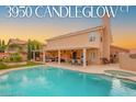 Beautiful backyard featuring a sparkling pool, spa, and covered patio for outdoor dining at 3950 Candleglow Ct, Las Vegas, NV 89147
