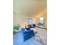 Bright living room features vaulted ceiling, open floor plan and natural light at 5381 Waving Sage Dr, Las Vegas, NV 89149
