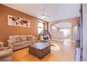 Open living space with wood floors, comfortable seating, and stylish decor at 6274 Elderberry Wine Ave, Las Vegas, NV 89142
