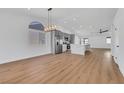 Bright, open-concept kitchen features new stainless steel appliances and ample counter space, ideal for entertaining at 6664 Rutgers Dr, Las Vegas, NV 89156