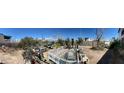 Overgrown backyard area filled with materials and debris to be removed and landscaped at 7300 Mountain Moss Dr, Las Vegas, NV 89147