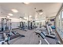 Bright gym with modern equipment and large windows overlooking the outdoor pool at 150 Las Vegas Blvd # 1606, Las Vegas, NV 89101