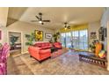 Open living room with stylish furnishings and a view from behind the breakfast bar at 150 Las Vegas Blvd # 1606, Las Vegas, NV 89101