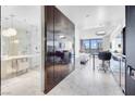 Spacious interior showcasing the seamless flow of the open-concept design, including the bathroom, kitchen, and bedroom at 4381 W Flamingo Rd # 3120, Las Vegas, NV 89103
