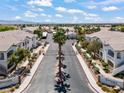 Aerial view showcasing the Terrasanta Condominiums entrance, manicured landscaping, and inviting community layout at 5655 E Sahara Ave # 2044, Las Vegas, NV 89142