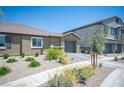 Charming single-story home featuring desert landscaping and a two-car garage at 7890 Aurora Sky St # 1, North Las Vegas, NV 89084