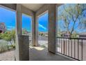 Private patio with views of the neighborhood and ample space for outdoor seating and relaxation at 96 Campbelltown Ave, Henderson, NV 89015