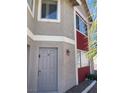 Close-up of apartment #18 with a well-maintained door, modern lock, and clean facade at 100 S Crestline Dr # 18, Las Vegas, NV 89107