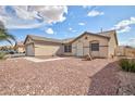 Beautiful single-story home with low-maintenance landscaping, and a well-manicured lawn at 1117 Azure Heights Pl, Las Vegas, NV 89110