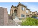 Charming home featuring an inviting entryway with well-manicured landscaping at 2208 Dale Bumpers Ct, North Las Vegas, NV 89081