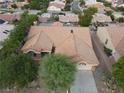 Aerial view of a single-story house with a well-maintained tile roof and desert landscaping at 2540 Faiss Dr, Las Vegas, NV 89134