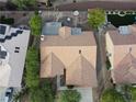Overhead shot of desert landscaped backyard with pool and lounge area at 2540 Faiss Dr, Las Vegas, NV 89134