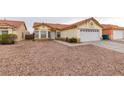 Charming single-story home with a well-maintained lawn, desert landscaping, and a two-car garage at 2595 Fort Lauderdale Dr, Las Vegas, NV 89156