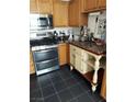 Modern kitchen with stainless steel appliances and stylish countertops at 3425 E Russell Rd # 161, Las Vegas, NV 89120