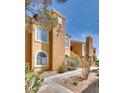 Charming condo building with well-maintained landscaping and private entrance at 7950 W Flamingo Rd # 2065, Las Vegas, NV 89147